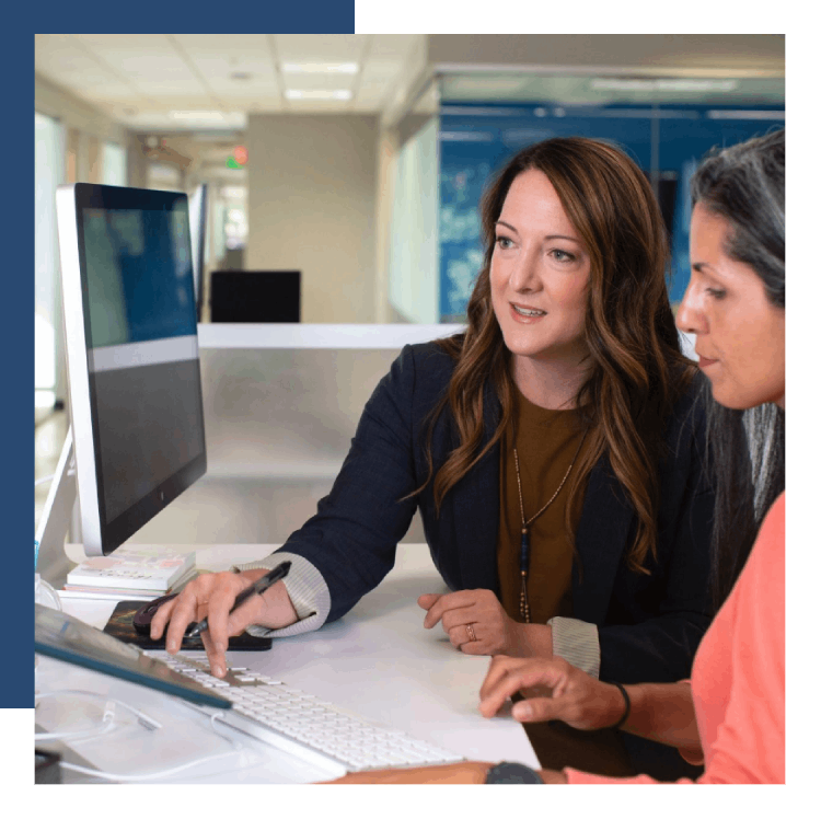 Women collaborating at a computer