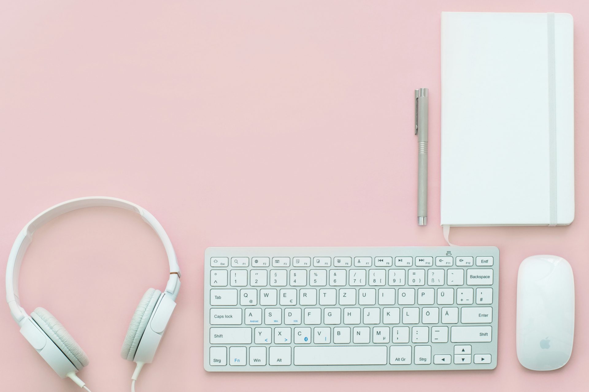 Desk setup with keyboard and headphones